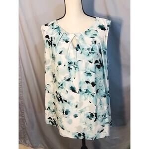 Kasper  top with mixed pastels of  blues and teal tones.